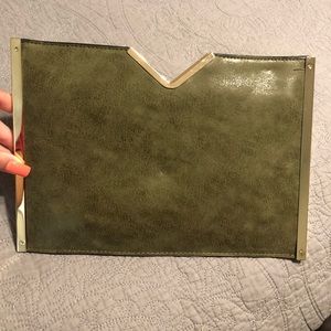 Green and gold clutch